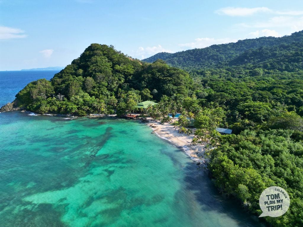 Aerial view of the biodiverse Chocó coast — rainforest meeting the sea